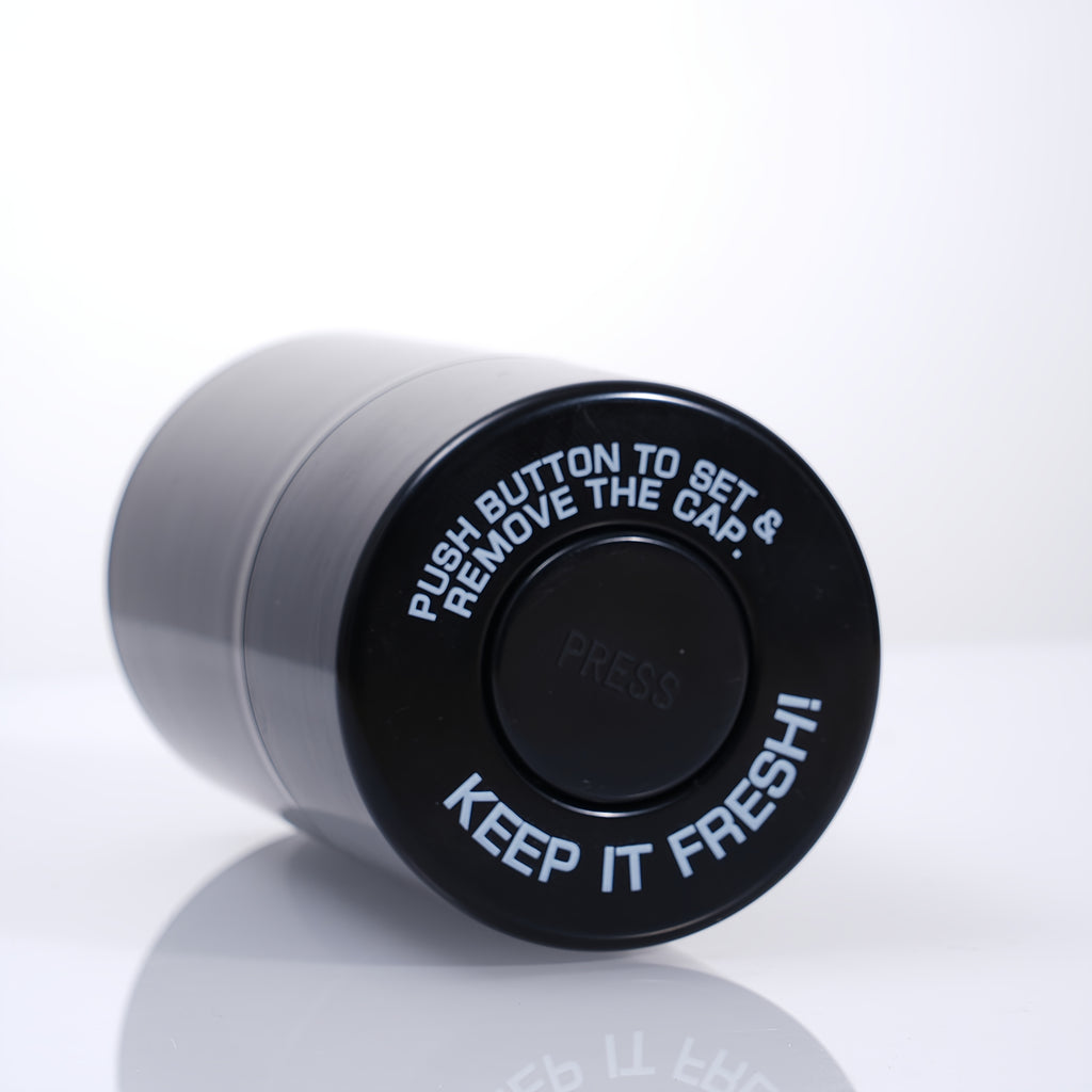 Black airtight storage jar lid with “KEEP IT FRESH” text