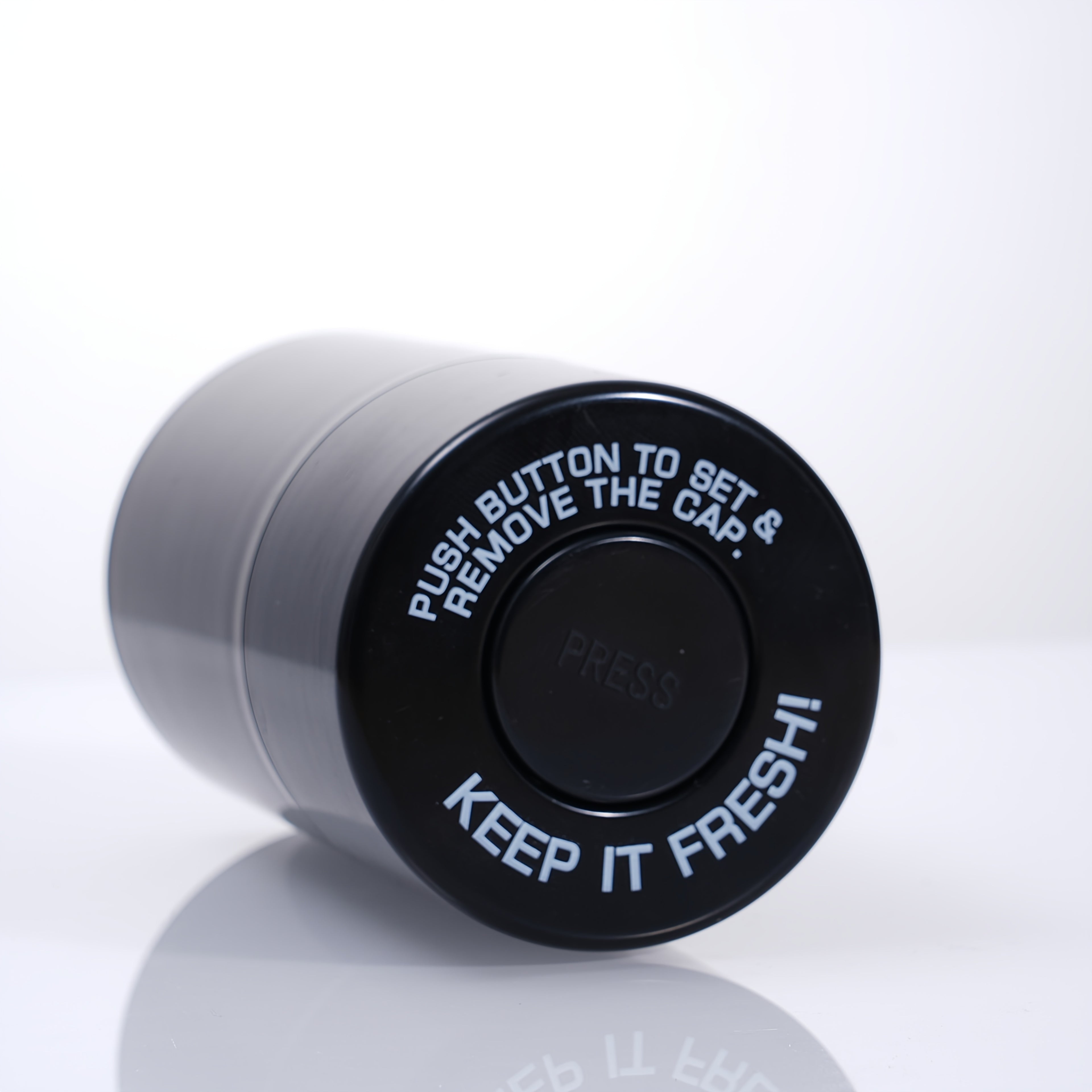 Black airtight storage jar lid with “KEEP IT FRESH” text