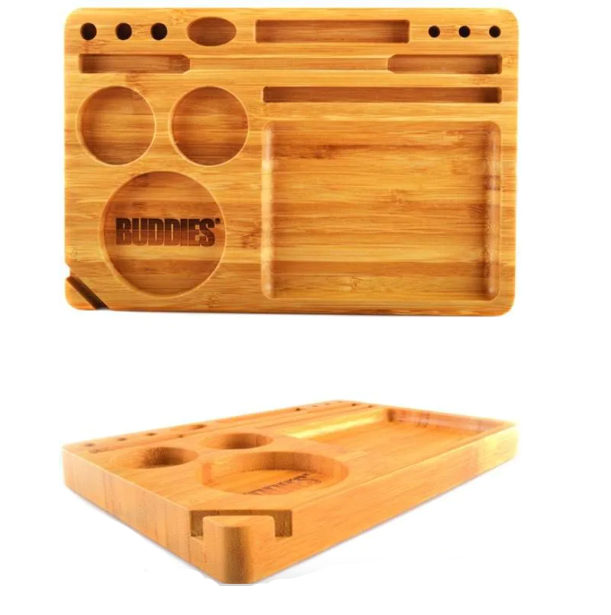 Small bamboo rolling tray with paw print logo, circular cutouts, and rectangular rolling area