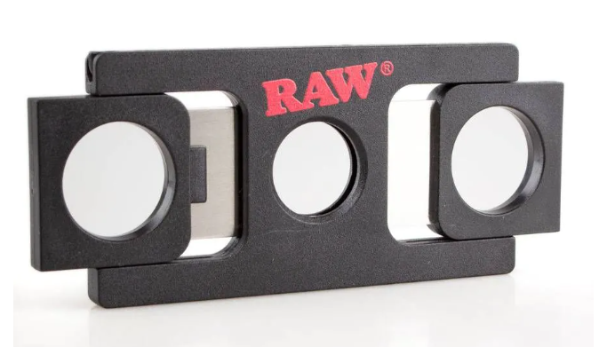 RAW cone cutter with black metal base, red RAW logo, and circular cutouts