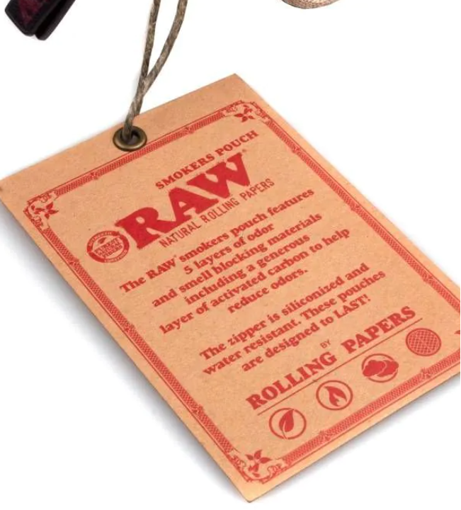 Beige pouch bag with attached paper hang tag featuring RAW rolling papers details