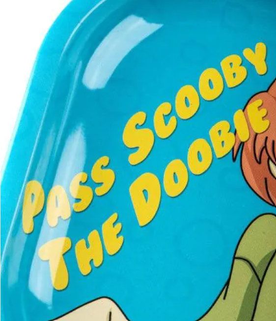 Turquoise metal rolling tray close-up with Scooby-Doo text graphic