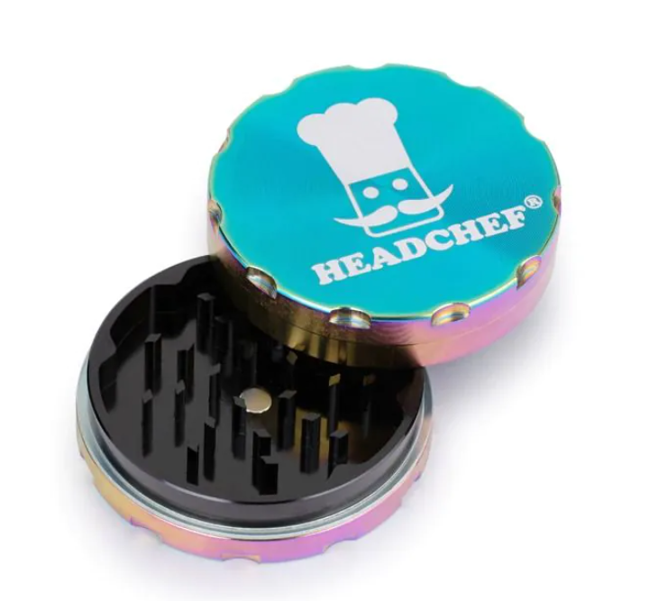 Iridescent chrome two-piece grinder with teal HEADCHEF lid and black grinder teeth