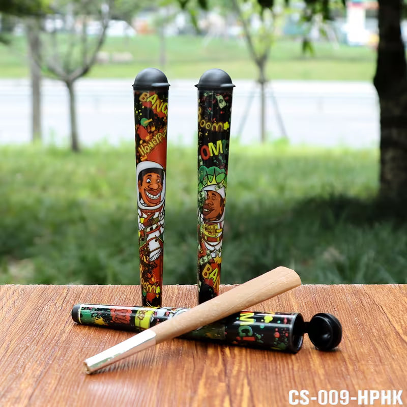 Two airtight 118mm joint storage tubes with black caps and comic graphics, on table.