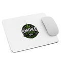 White mouse pad with Smoke Store logo, smooth surface and rounded corners.