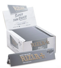 Slim rolling papers box in silver with RIZLA+ branding, open display tray
