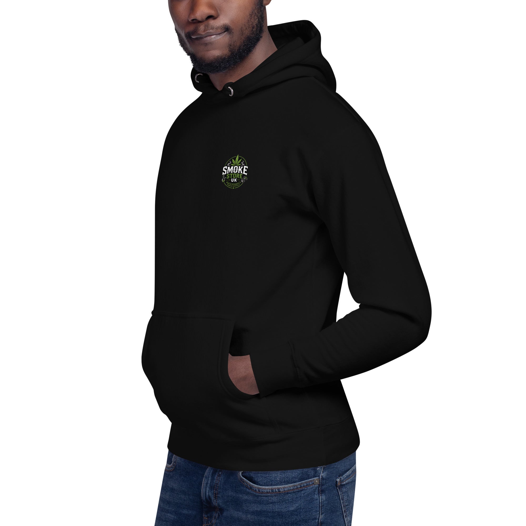 Black unisex hoodie with hood drawstring and small chest logo, worn with jeans.
