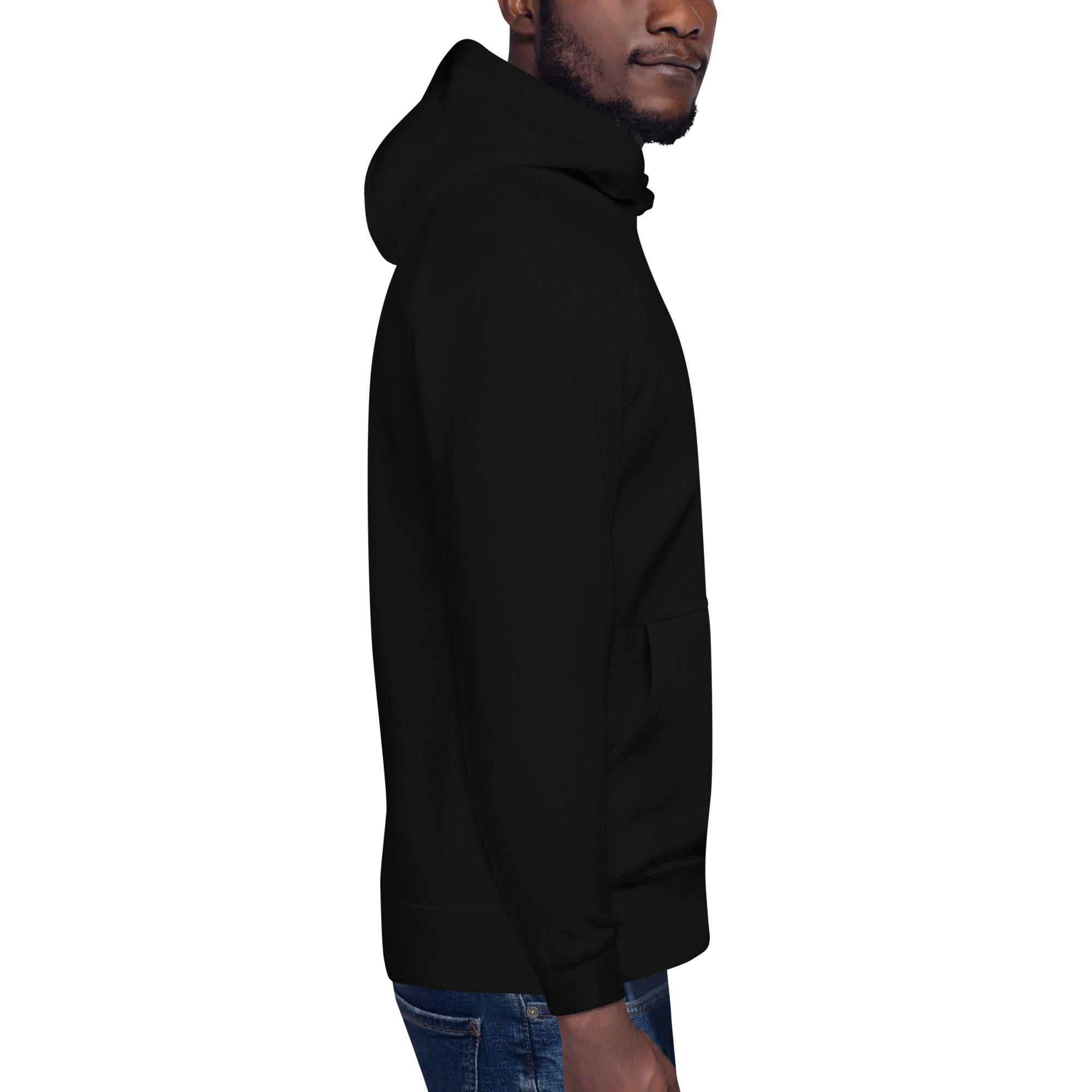 Black unisex hoodie side view with hood and kangaroo pocket, worn with blue jeans.
