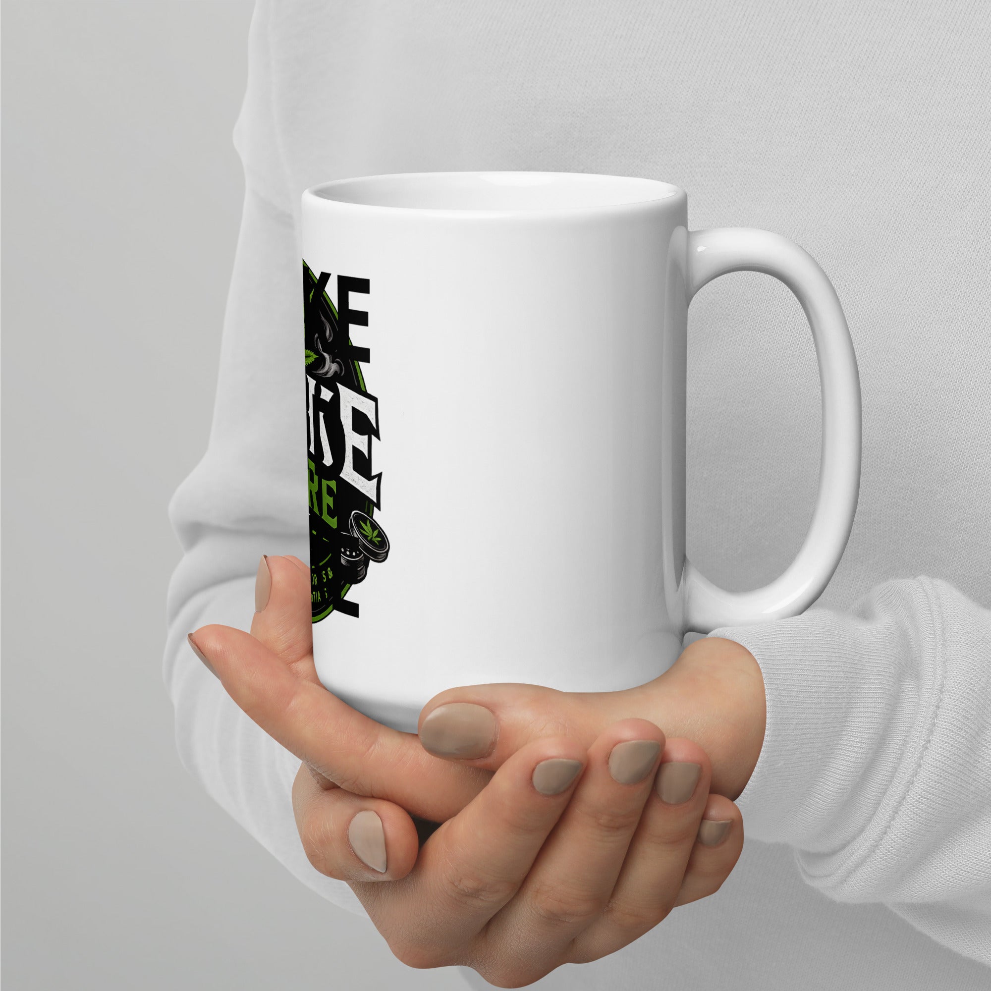 White glossy mug held in hands with partial “WAKE AND BAKE” print